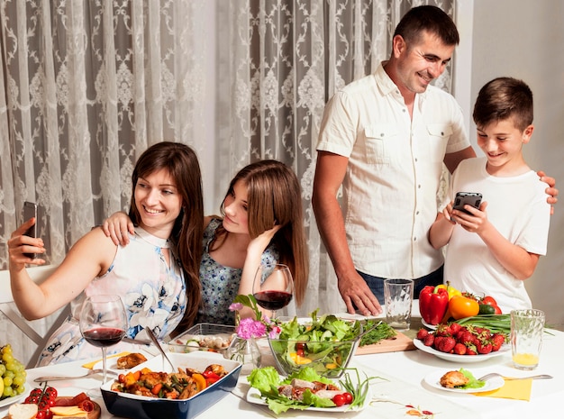 Family having a great time at dinner table