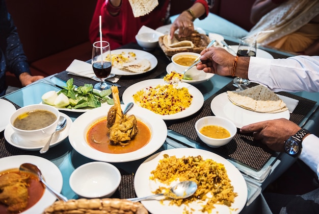 Free photo family having indian food