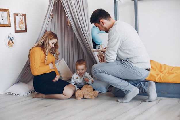 Family at home sitting on the floor