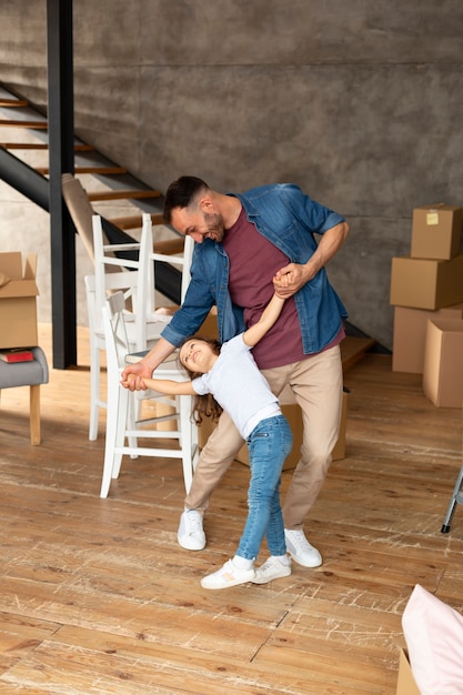 Free Photo family moving in a new home