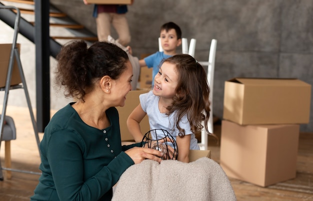 Free Photo family moving in a new home