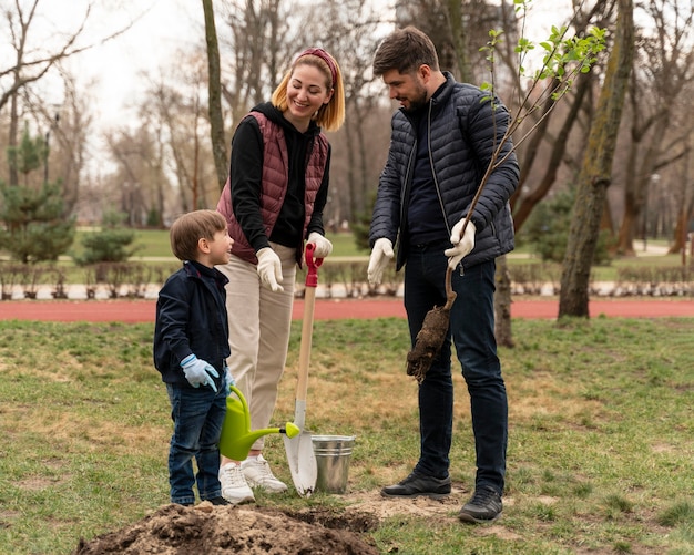 Family plating together in the ground outdoors