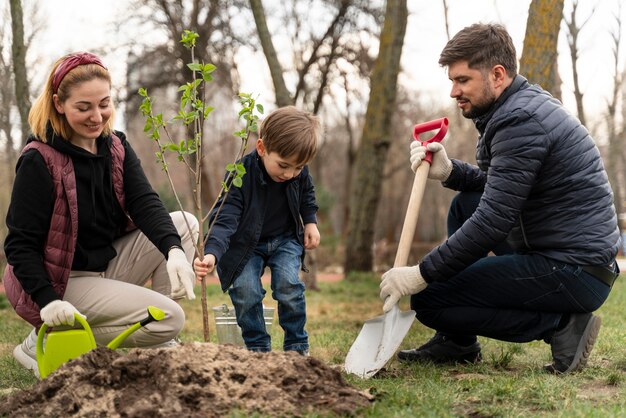 Family plating together in the ground outdoors