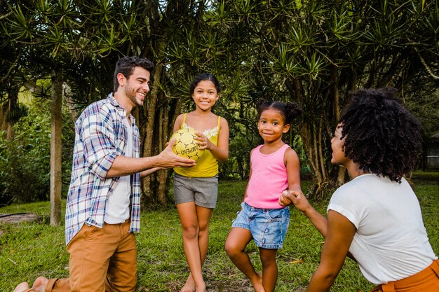 Family playing ball together