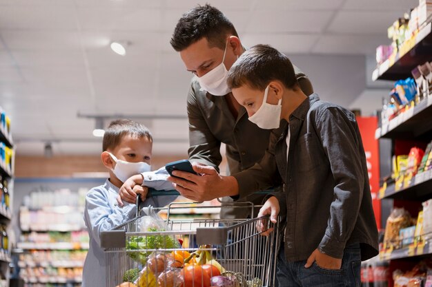 Family shopping with face mask