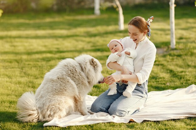 Family spend time in a summer garden