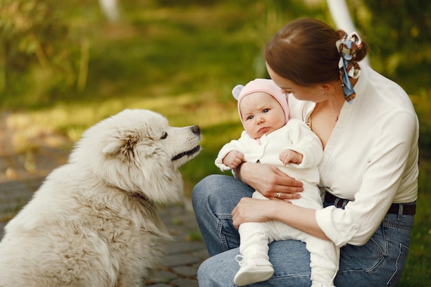 Family spend time in a summer garden