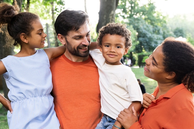 Free photo family spending time together outdoors in the park