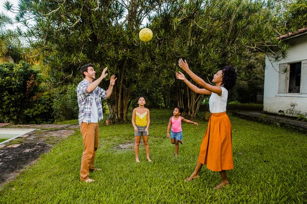 Family throwing ball