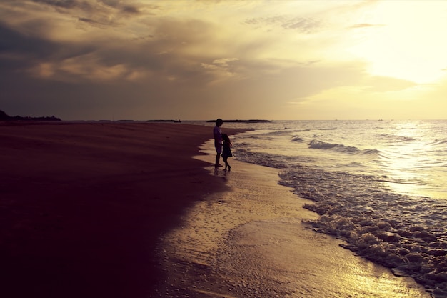 Family walk beach