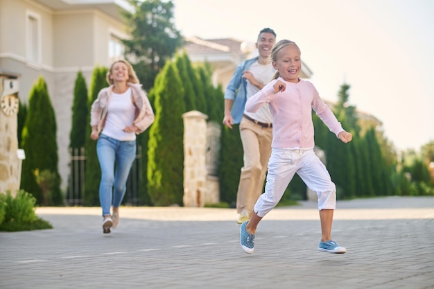 Family walk. Young family having a walk and enjoying