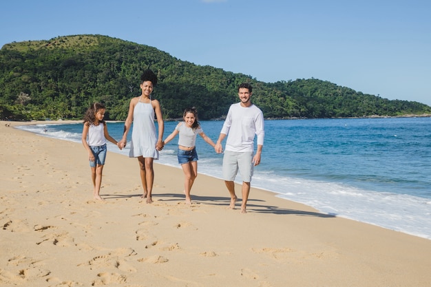 Family walking on the beach