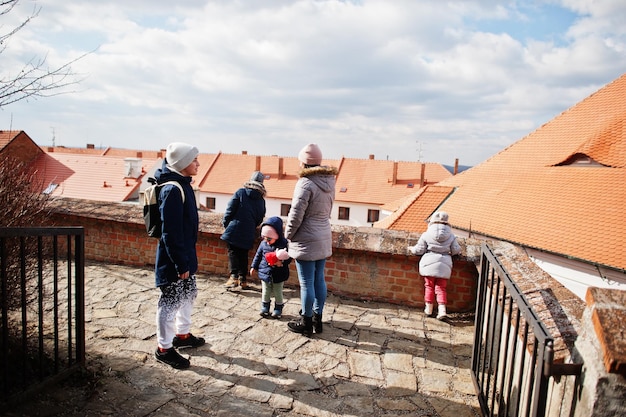 Family walking at historical Mikulov Castle Moravia Czech Republic Old European town