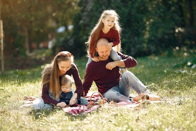 Family with cute kids in a autumn park