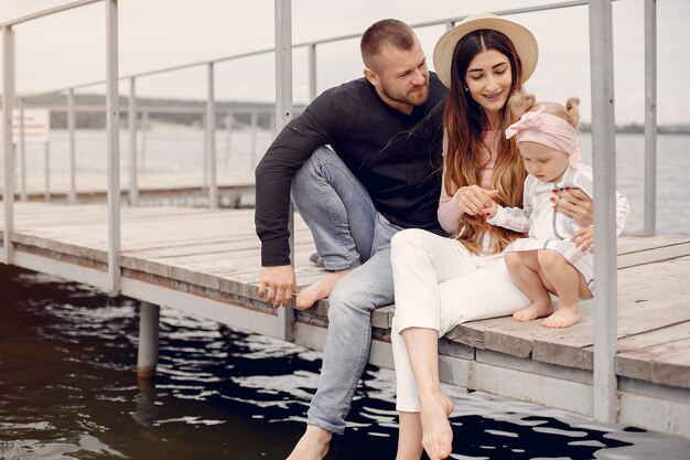 Family with daughter playing in a park