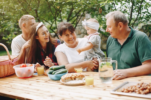 Family with daughter playing in the yard