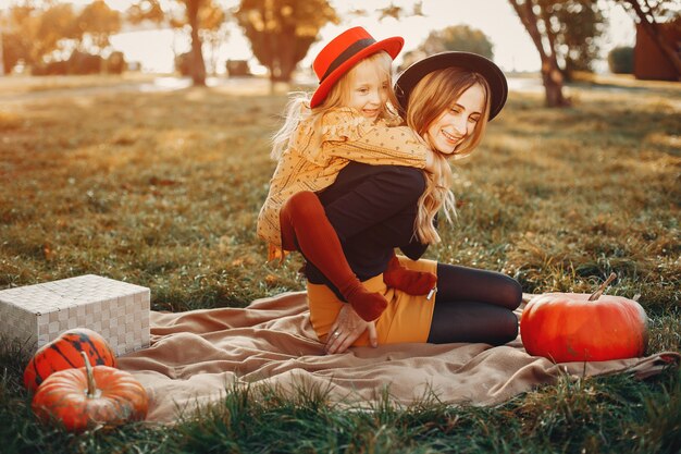 Family with pumpkins