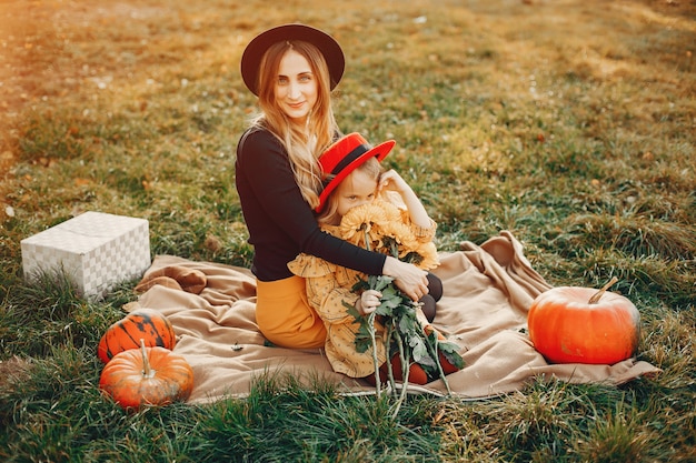 Family with pumpkins