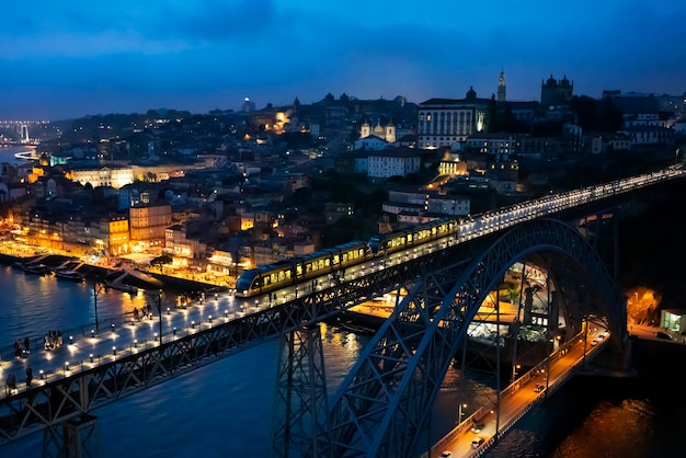 Free photo famous bridge luis i by night, porto, portugal, europe