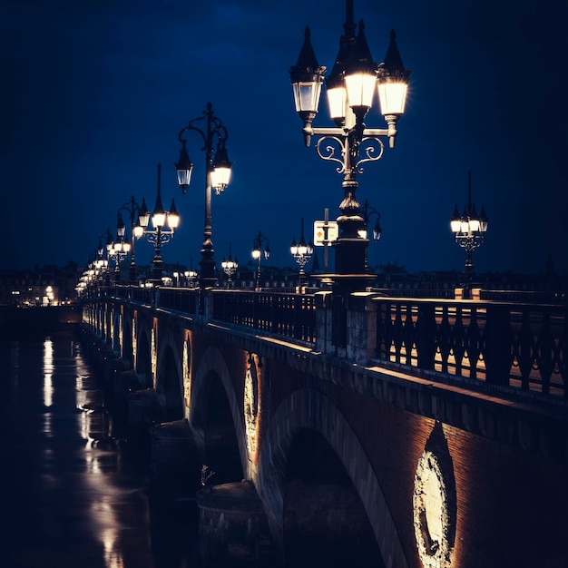 Free photo famous stone bridge in bordeaux by night france