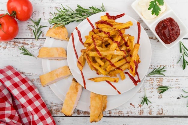 Free Photo fancy dish with french fries and ketchup