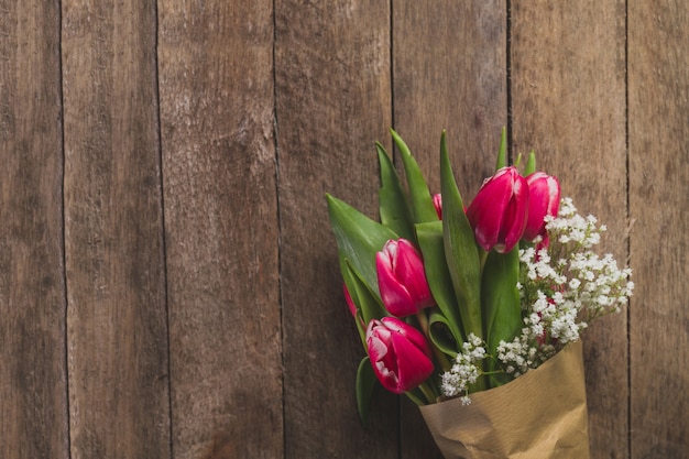 Fantastic bouquet on wooden table