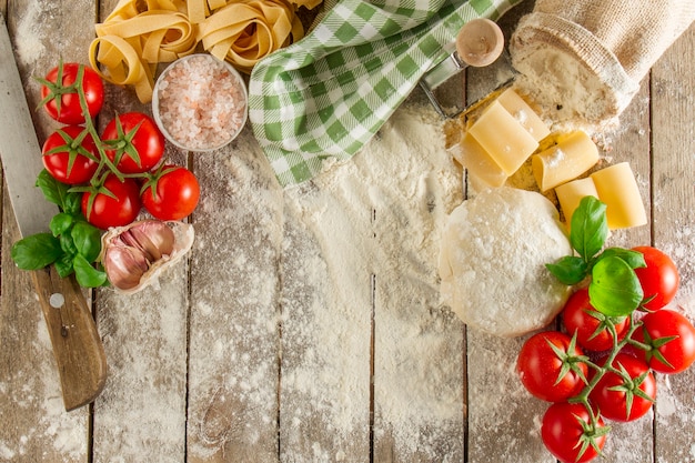 Free photo fantastic scene with flour and fresh ingredients