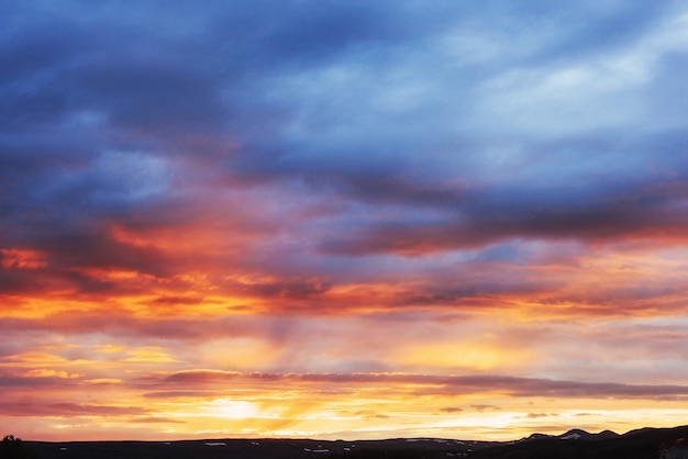 Fantastic sunset in the mountains cumulus clouds