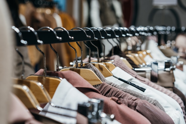 Fashion clothing on hangers at the show