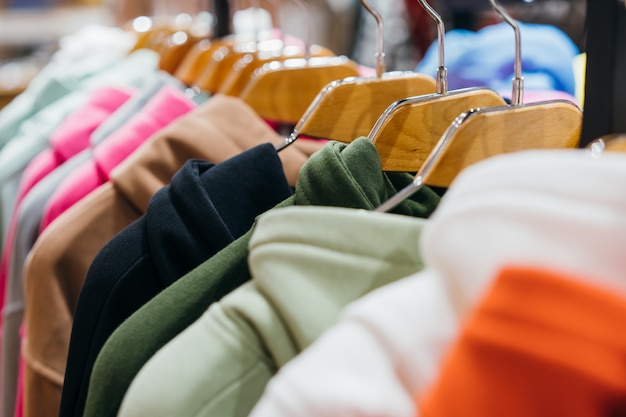 Fashion clothing on hangers at the show