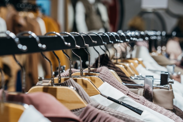 Fashion clothing on hangers at the show