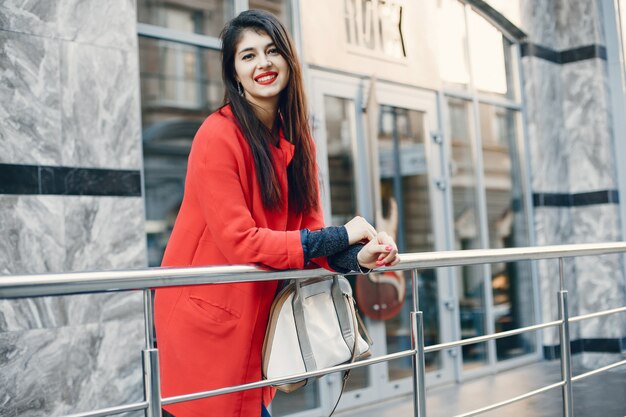 Fashion girl walking in a summer city