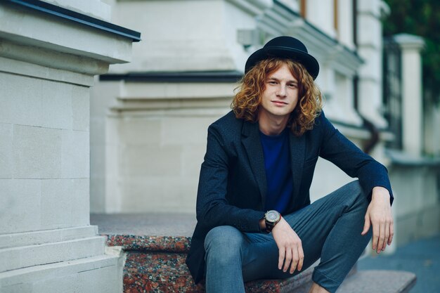 Fashion portrait of young beautiful man