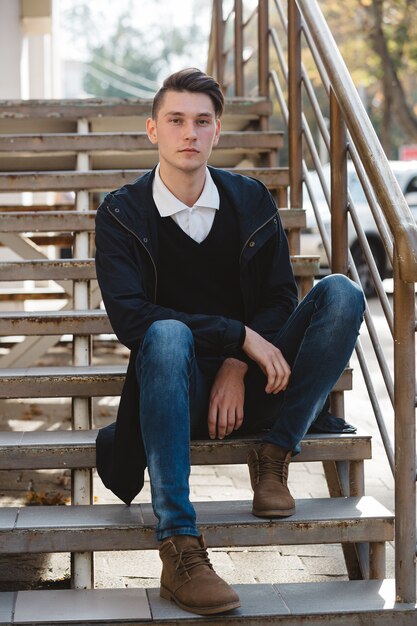 Fashionable handsome man model posing