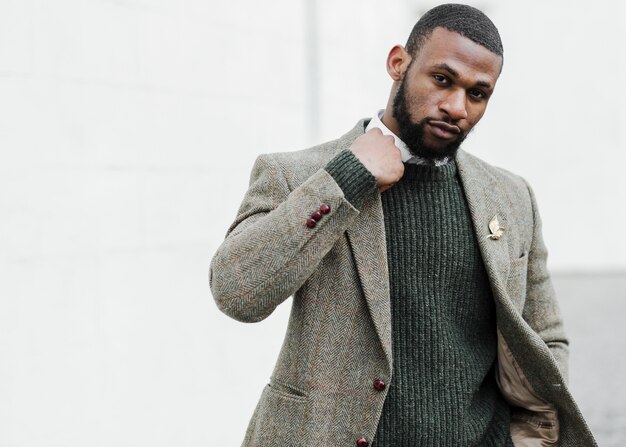 Fashionable man posing outside with copy space