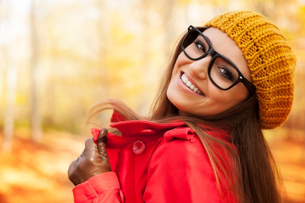 Fashionable young woman enjoying in autumn season