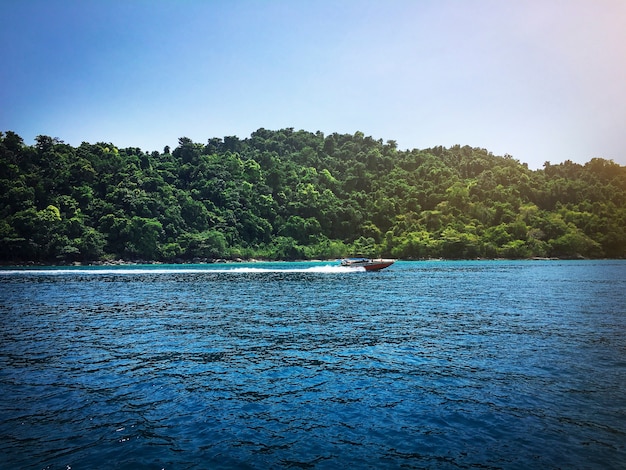 Fast boat navigating on the river 