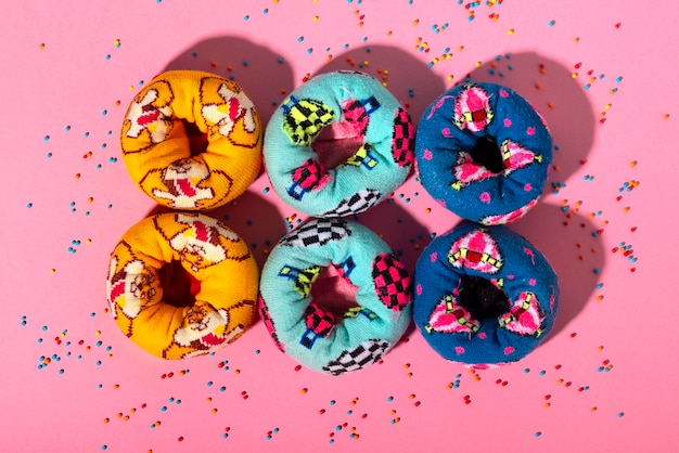 Free photo fast fashion concept with materials and textiles disguised as donuts