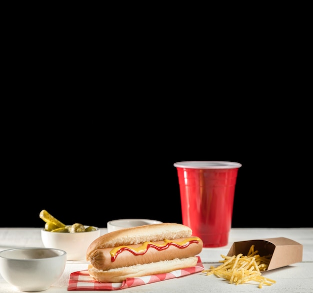 Fast food hot dog and soda copy space