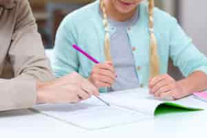 Free photo father being a tutor for her daughter close-up