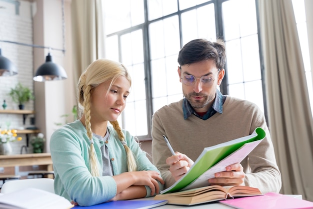 Father being a tutor for her daughter