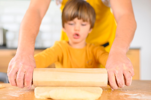 Father and blurred son using the paddle