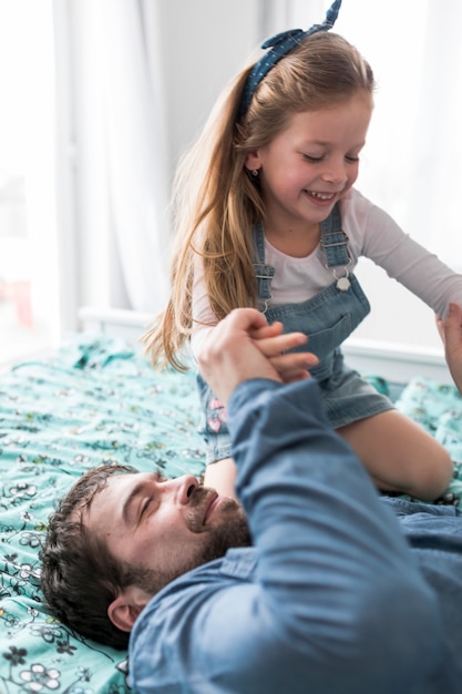 Free photo father celebrating fathers day with his daughter