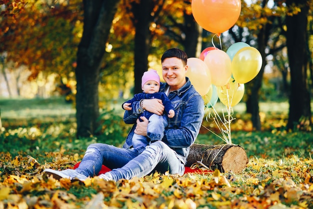 Father and daughter having fun in the park 