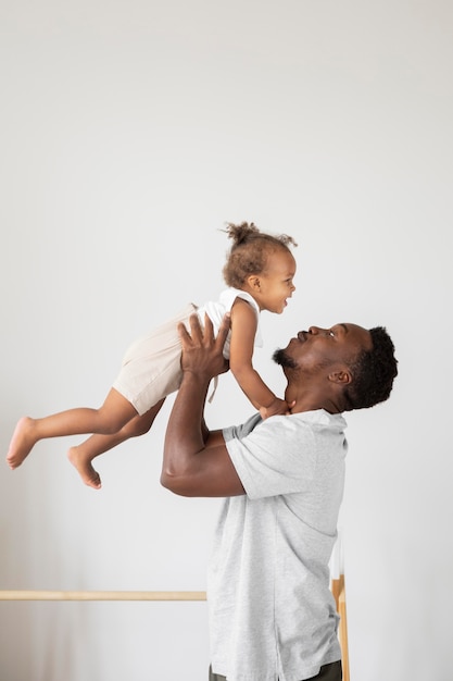 Father and little daughter spending time together