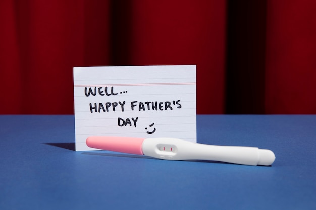 Free photo father's day celebration with pregnancy test