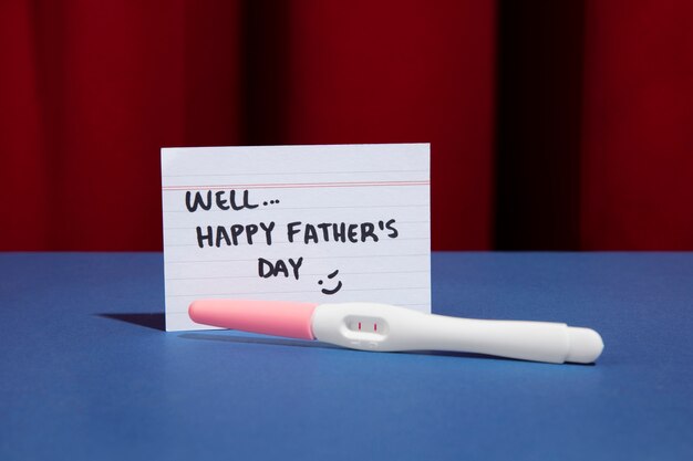 Father's day celebration with pregnancy test