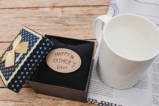 Father's day composition with box and white mug