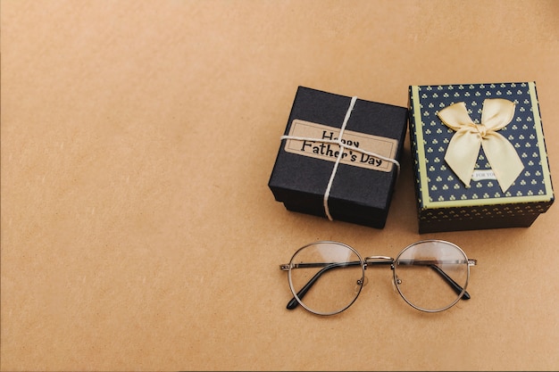 Free photo father's day composition with gifts and glasses