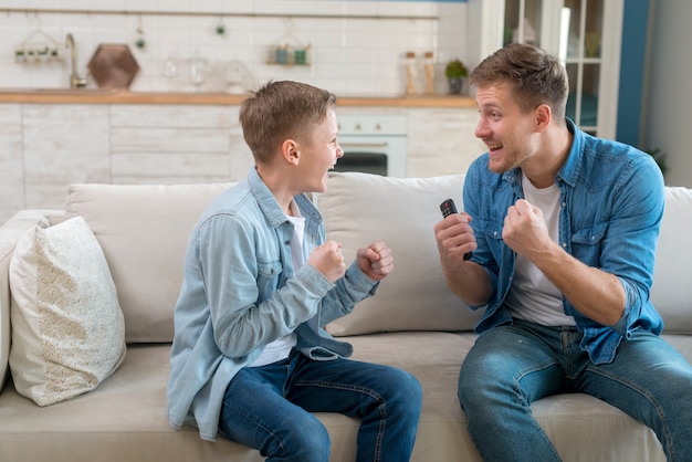 Free photo father and son being excited